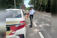 Ops Khas Lampu Isyarat Merah yang dilancarkan serentak di seluruh Negeri Sembilan bermula pada Rabu. Foto ihsan JSPT